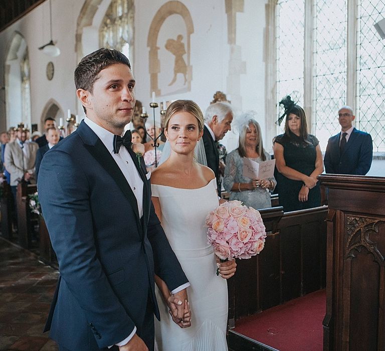 Church Wedding Ceremony | Bride in Suzanne Neville Bardot Nouveau Wedding Dress | Groom in Black Tie | Pastel Pink &amp; Mint Green Wedding at Granary Estates Suffolk | Julia &amp; You Photography