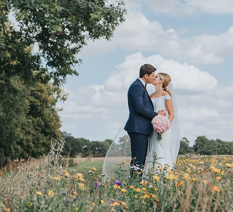 Bride in Suzanne Neville Bardot Nouveau Wedding Dress | Groom in Black Tie | Pastel Pink &amp; Mint Green Wedding at Granary Estates Suffolk | Julia &amp; You Photography