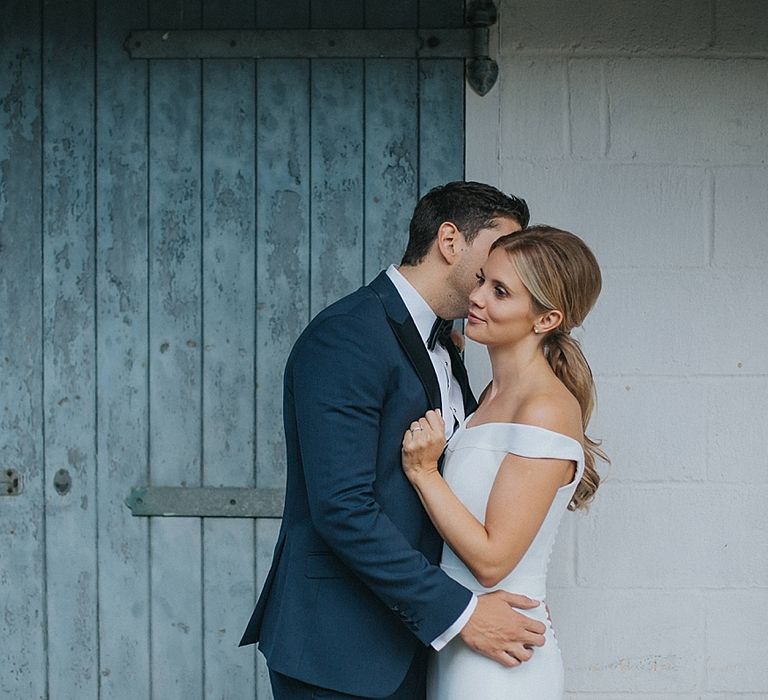 Bride in Suzanne Neville Bardot Nouveau Wedding Dress | Groom in Black Tie | Pastel Pink &amp; Mint Green Wedding at Granary Estates Suffolk | Julia &amp; You Photography