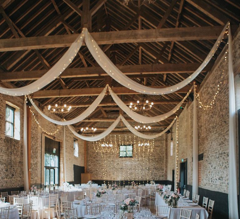 Fairy Lights &amp; Drapes Wedding Reception Decor | Pastel Pink &amp; Mint Green Wedding at Granary Estates Suffolk | Julia &amp; You Photography