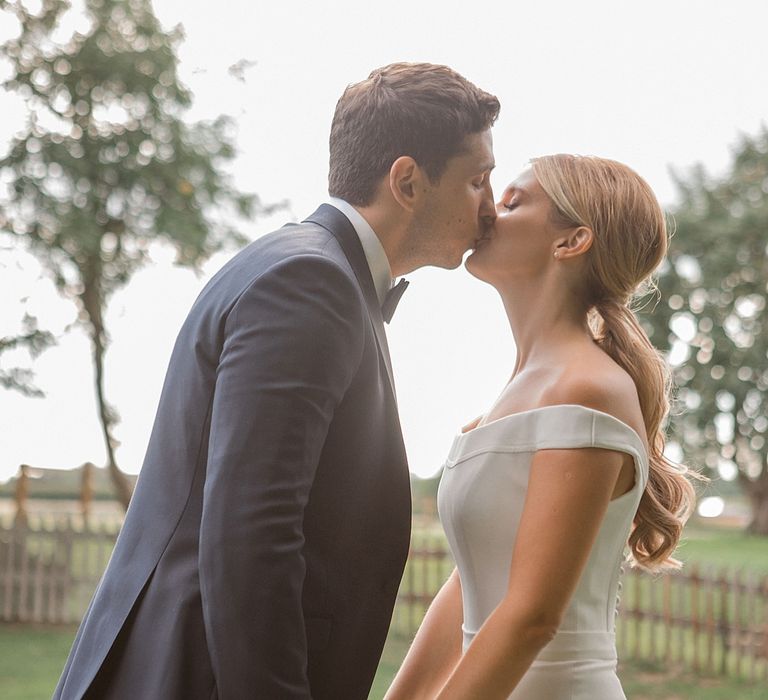 Bride in Suzanne Neville Bardot Nouveau Wedding Dress | Groom in Black Tie | Pastel Pink &amp; Mint Green Wedding at Granary Estates Suffolk | Julia &amp; You Photography