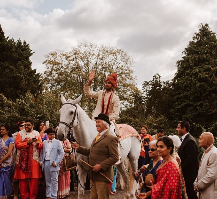 Indian groom's entry/jann on a white horse