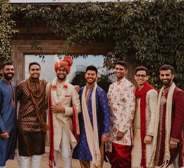 Groom and groomsmen in traditional Indian dress