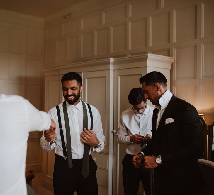 Groomsmen getting ready at Elmore Court for civil wedding ceremony