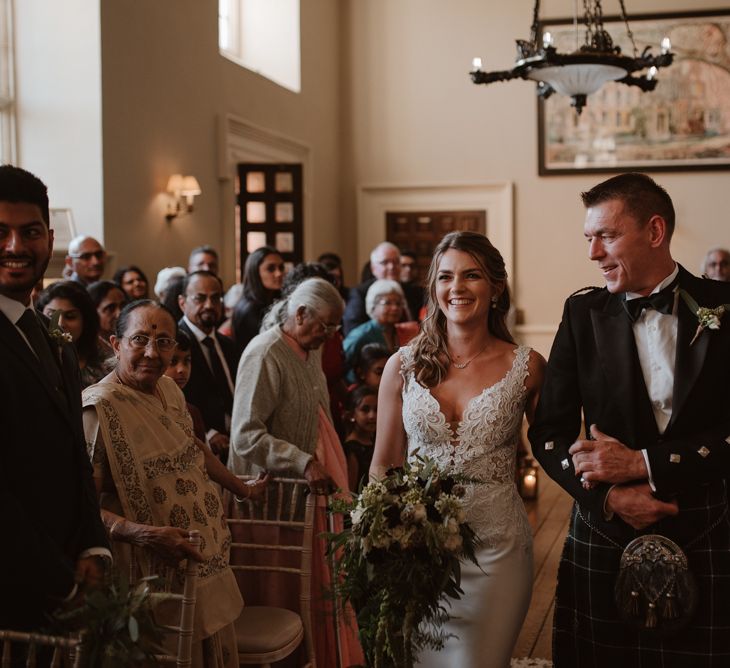 Civil wedding ceremony bridal entrance in fitted dress