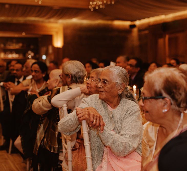 Wedding guests listening attentively at wedding speeches