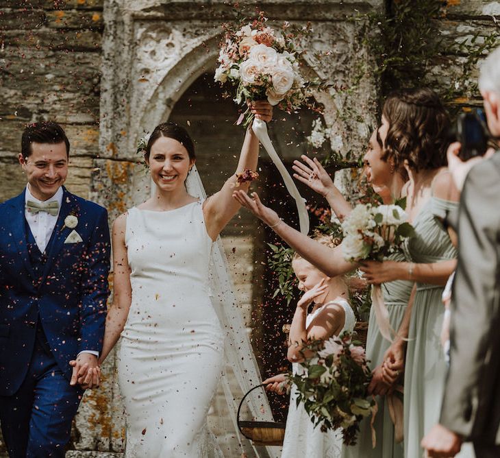 Wedding Ceremony | Bride in Lace Back Pronovias Wedding Dress | Groom in Hawes and Curtis Navy Suit &amp; Bow Tie | Outdoor Cornish Wedding at Boconnoc Estate | Nick Walker Photography