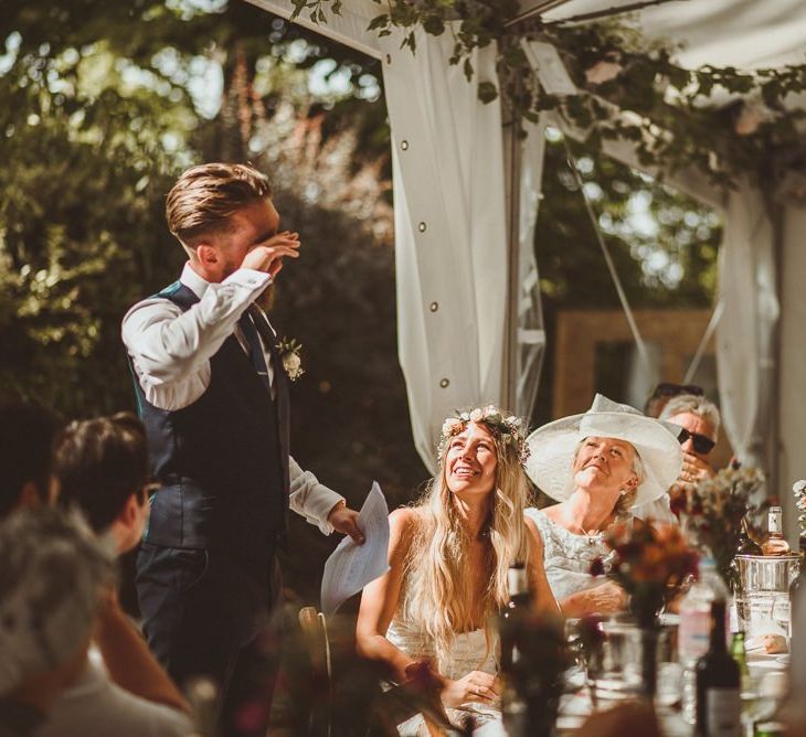 Groom Makes Speech While Bride Looks On