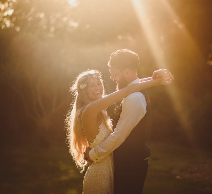 Sunset Couple Portrait With Bride In Flower Crown