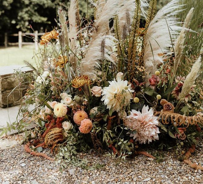 Boho floral arrangement with pampas grass and dahlias