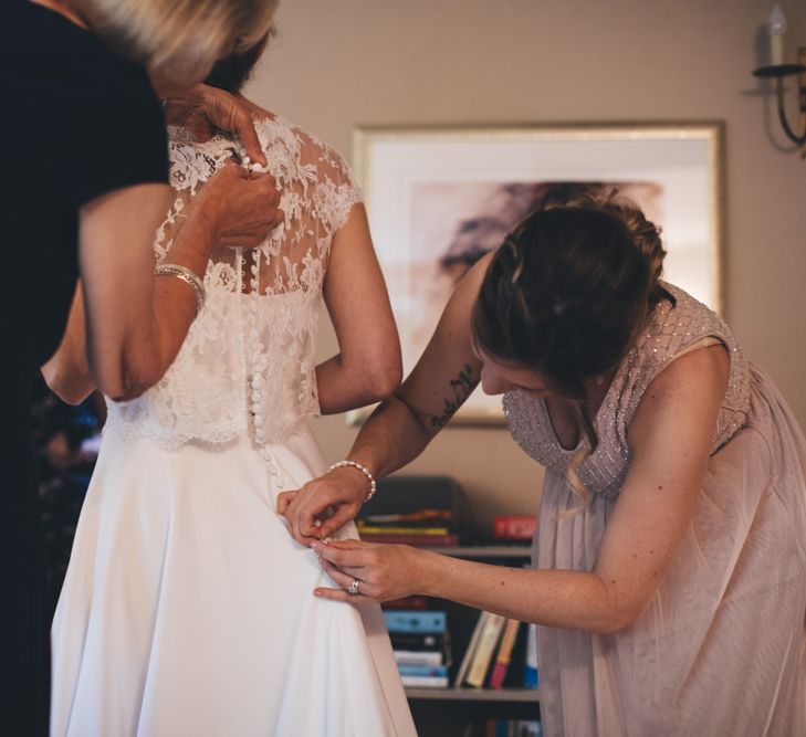 Military Wedding in Rutland Village with Marquee Reception filled with Swallows and Damsons Flowers | Jesús Peiró Bridal Gown | Pink Monsoon Bridesmaid Dresses | Mike Plunkett Photography