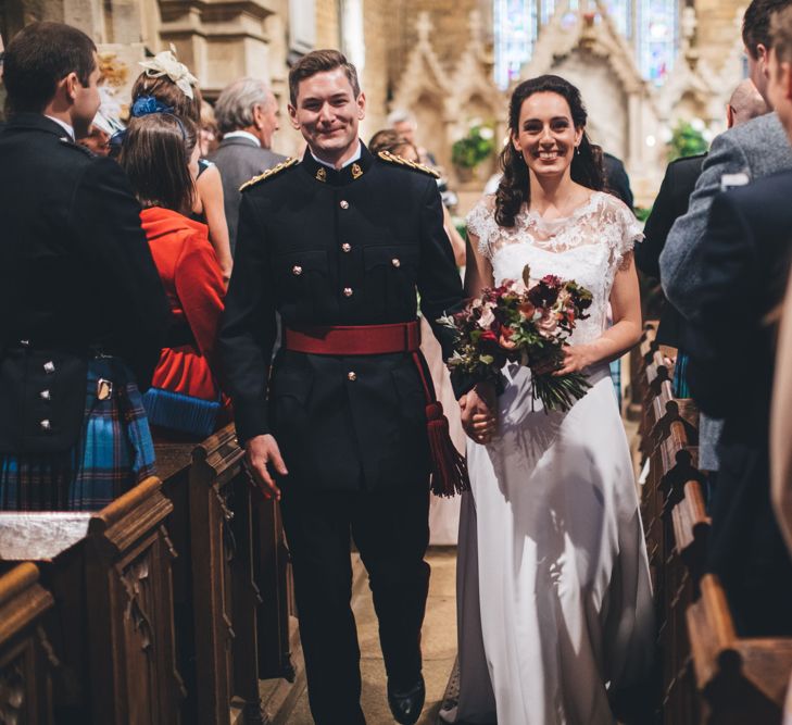 Military Wedding in Rutland Village with Marquee Reception filled with Swallows and Damsons Flowers | Jesús Peiró Bridal Gown | Pink Monsoon Bridesmaid Dresses | Mike Plunkett Photography