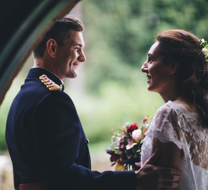 Military Wedding in Rutland Village with Marquee Reception filled with Swallows and Damsons Flowers | Jesús Peiró Bridal Gown | Pink Monsoon Bridesmaid Dresses | Mike Plunkett Photography