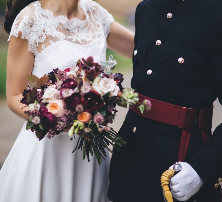 Military Wedding in Rutland Village with Marquee Reception filled with Swallows and Damsons Flowers | Jesús Peiró Bridal Gown | Pink Monsoon Bridesmaid Dresses | Mike Plunkett Photography