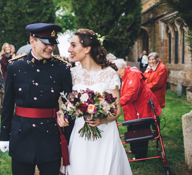 Military Wedding in Rutland Village with Marquee Reception filled with Swallows and Damsons Flowers | Jesús Peiró Bridal Gown | Pink Monsoon Bridesmaid Dresses | Mike Plunkett Photography