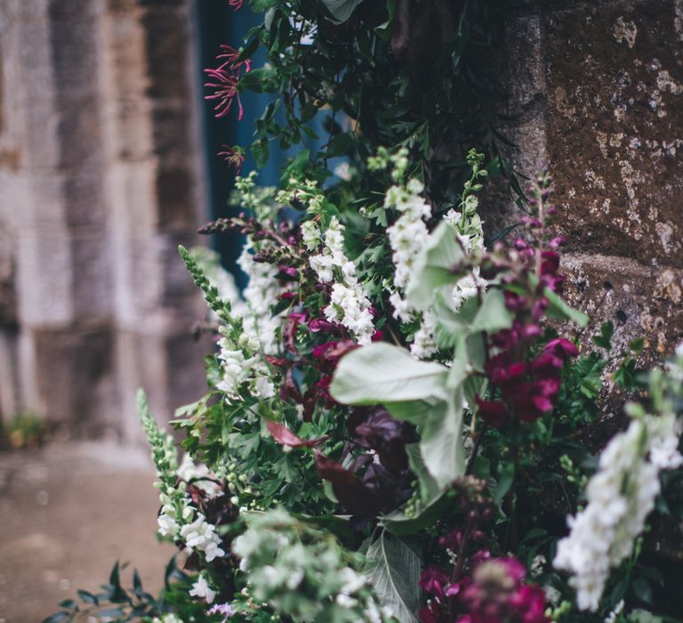 Military Wedding in Rutland Village with Marquee Reception filled with Swallows and Damsons Flowers | Jesús Peiró Bridal Gown | Pink Monsoon Bridesmaid Dresses | Mike Plunkett Photography