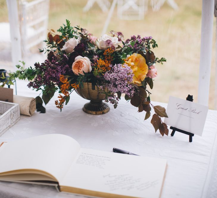 Military Wedding in Rutland Village with Marquee Reception filled with Swallows and Damsons Flowers | Jesús Peiró Bridal Gown | Pink Monsoon Bridesmaid Dresses | Mike Plunkett Photography