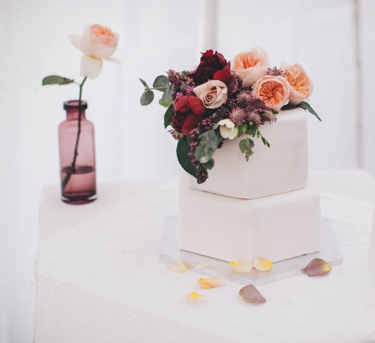 Military Wedding in Rutland Village with Marquee Reception filled with Swallows and Damsons Flowers | Jesús Peiró Bridal Gown | Pink Monsoon Bridesmaid Dresses | Mike Plunkett Photography