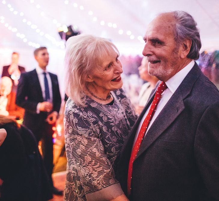 Military Wedding in Rutland Village with Marquee Reception filled with Swallows and Damsons Flowers | Jesús Peiró Bridal Gown | Pink Monsoon Bridesmaid Dresses | Mike Plunkett Photography