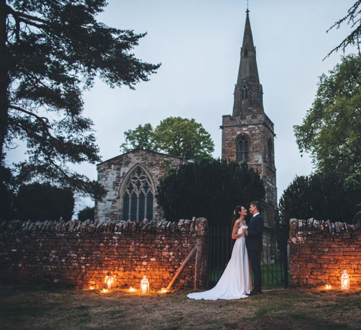 Military Wedding in Rutland Village with Marquee Reception filled with Swallows and Damsons Flowers | Jesús Peiró Bridal Gown | Pink Monsoon Bridesmaid Dresses | Mike Plunkett Photography