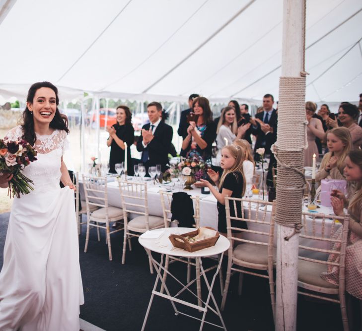 Military Wedding in Rutland Village with Marquee Reception filled with Swallows and Damsons Flowers | Jesús Peiró Bridal Gown | Pink Monsoon Bridesmaid Dresses | Mike Plunkett Photography