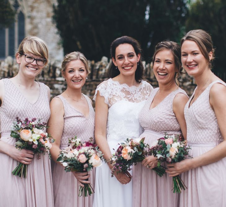 Military Wedding in Rutland Village with Marquee Reception filled with Swallows and Damsons Flowers | Jesús Peiró Bridal Gown | Pink Monsoon Bridesmaid Dresses | Mike Plunkett Photography