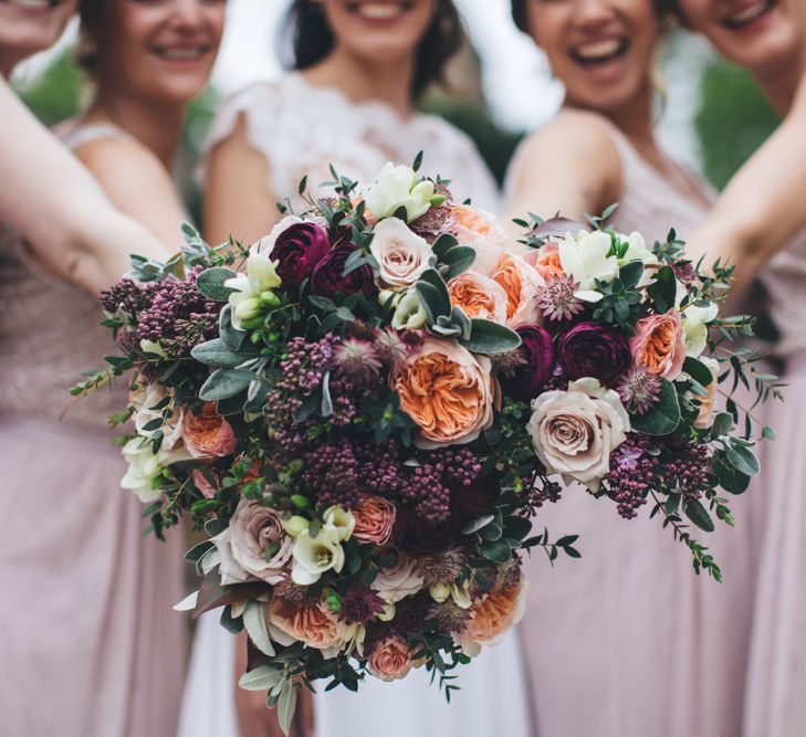 Military Wedding in Rutland Village with Marquee Reception filled with Swallows and Damsons Flowers | Jesús Peiró Bridal Gown | Pink Monsoon Bridesmaid Dresses | Mike Plunkett Photography