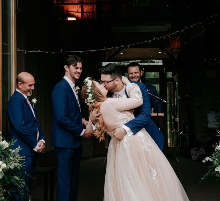 Bride and Groom Kiss After Vows