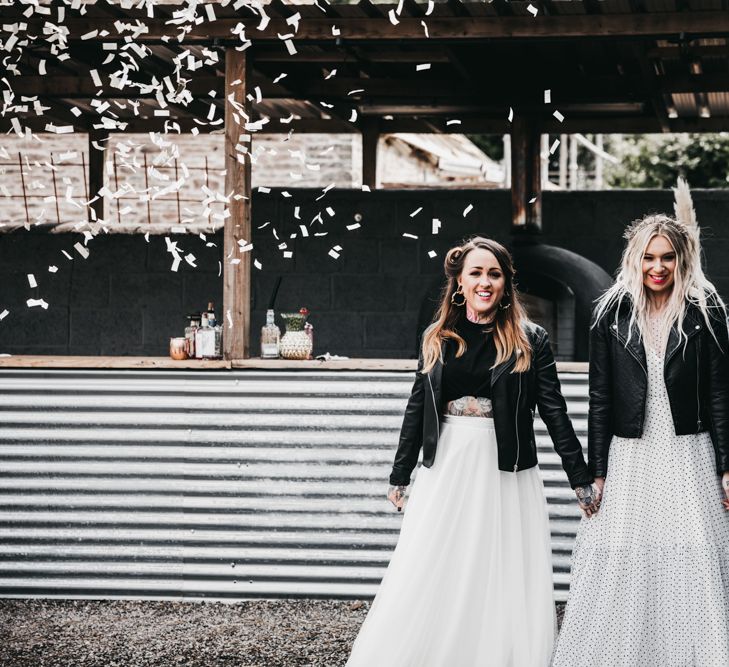 Confetti bomb moment with same-sex brides