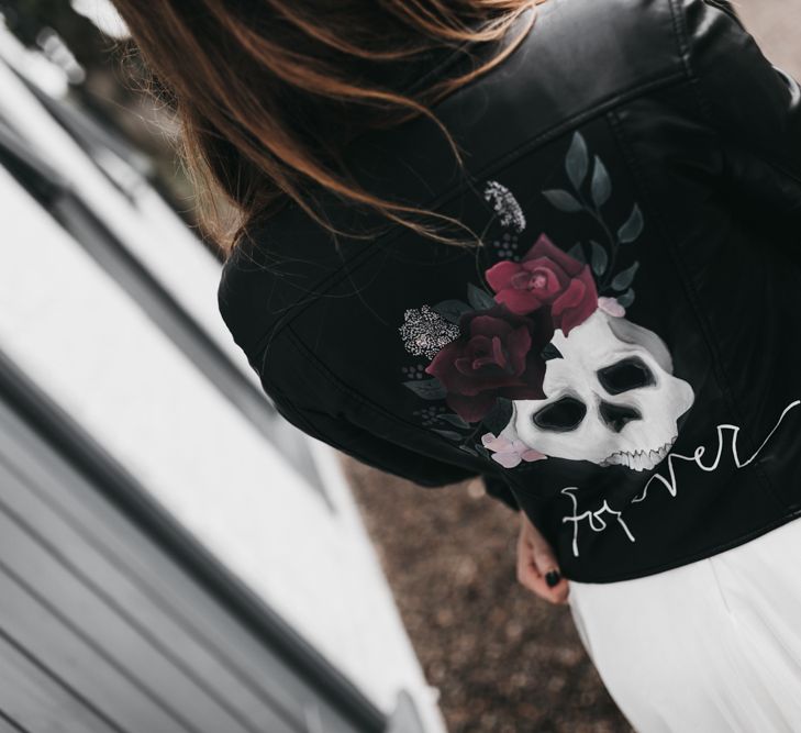 Leather jacket with skull print on the back