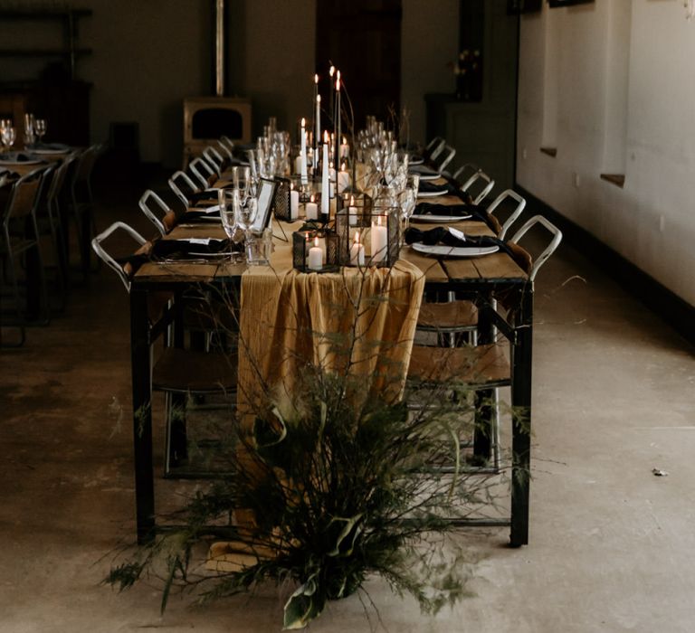 Elegant Table Decoration with Taper Candles, Tapper Candles and Foliage