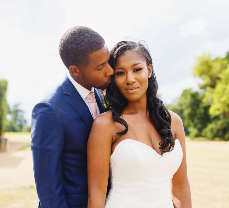 Black bride in strapless wedding dress