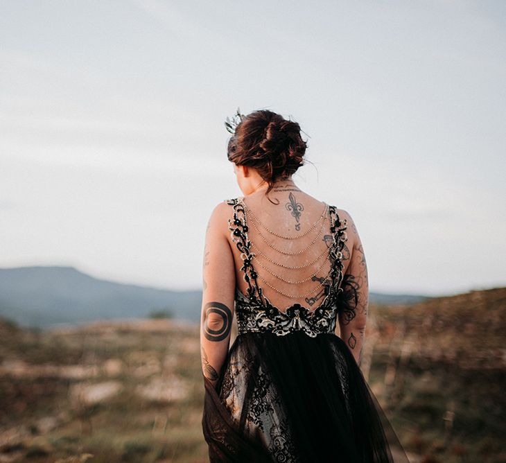 Alternative Bride in Antonia Serena Atelier Wedding Dress with Black Lace and Chain Detailed Back