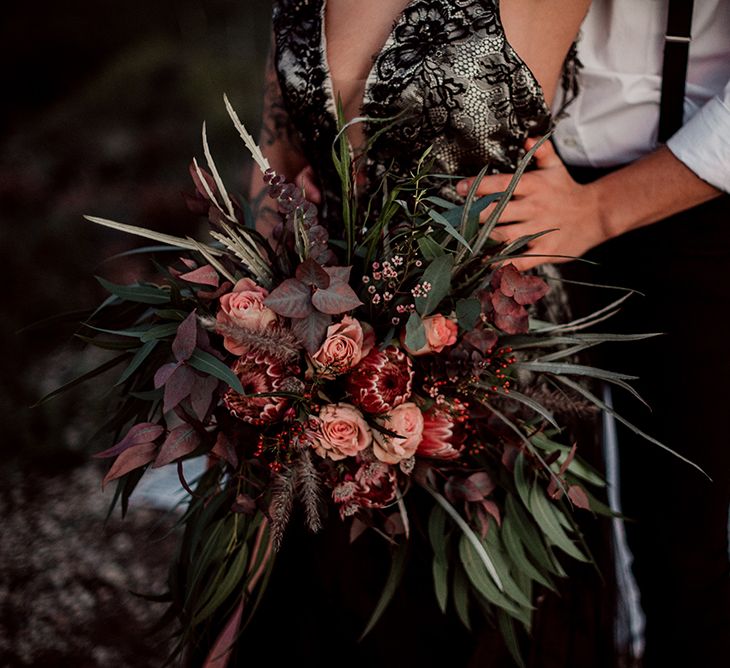 Deep Red and Foliage Wedding Bouquet with Proteas and Roses