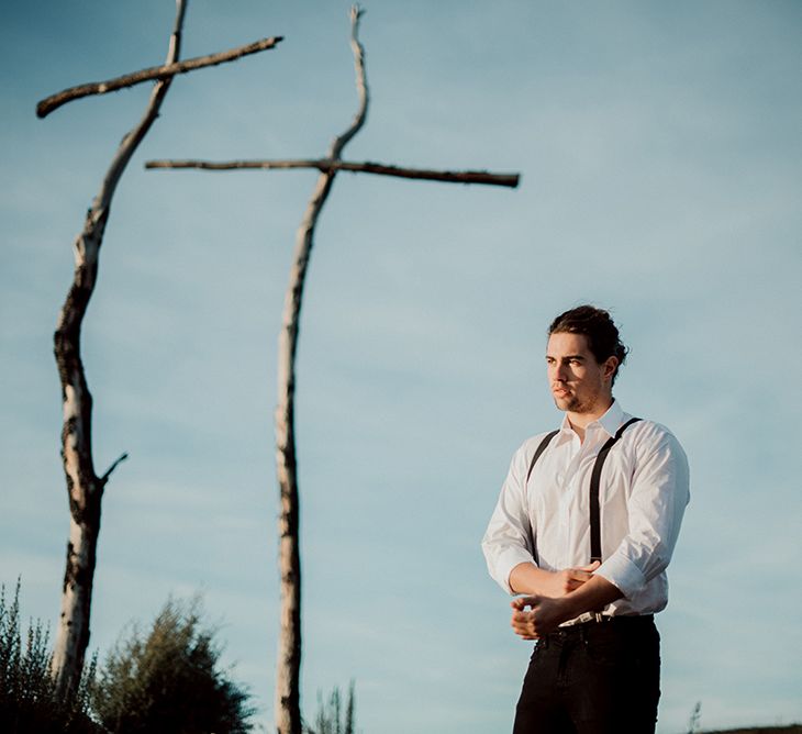 Groom in White Shirt and Black Braces