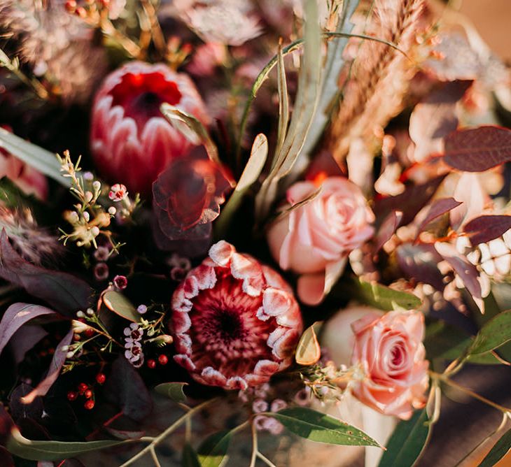 Deep Red and Green Wedding Flowers with Foliage, Roses and King Proteas