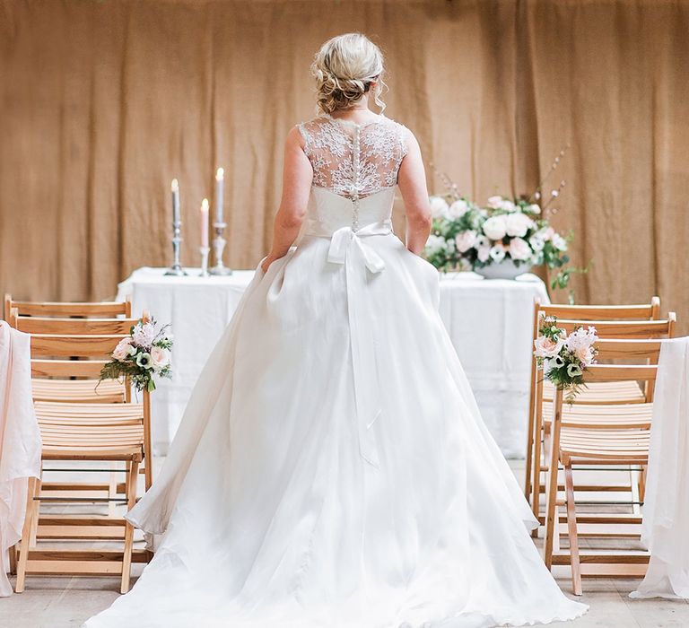 Bride at the Altar in Princess Wedding Dress | Blush Pink, Romantic, Country Wedding Inspiration at Tithe Barn, Dorset | Darima Frampton Photography