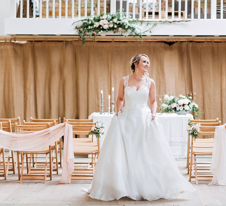 Bride at the Altar in Princess Wedding Dress | Blush Pink, Romantic, Country Wedding Inspiration at Tithe Barn, Dorset | Darima Frampton Photography