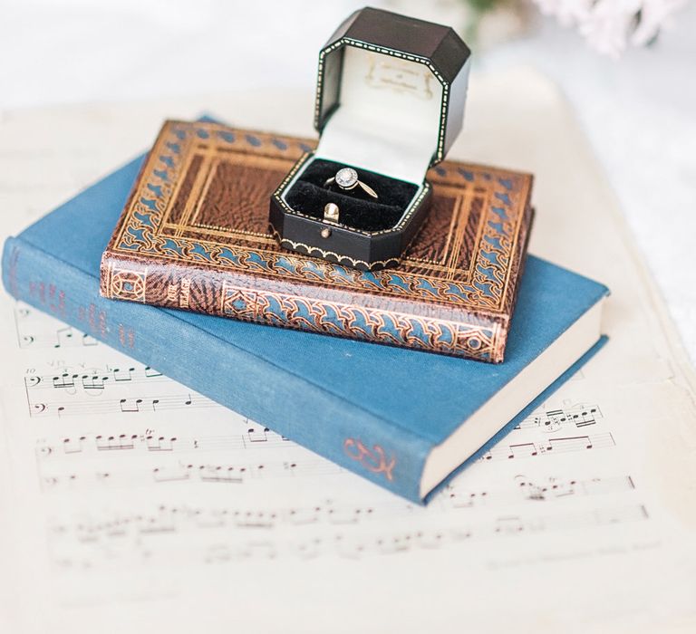 Wedding Ring on Vintage Books | Blush Pink, Romantic, Country Wedding Inspiration at Tithe Barn, Dorset | Darima Frampton Photography