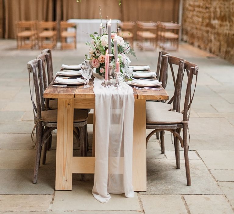 Elegant Tablescape with Taper Candles, Pink &amp; White Roses,  Ranunculus &amp; Anemone Floral Centrepiece &amp; Hanging Chandelier | Blush Pink, Romantic, Country Wedding Inspiration at Tithe Barn, Dorset | Darima Frampton Photography