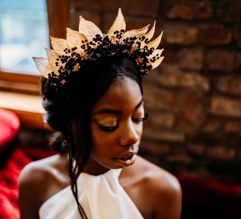 Black bride wedding makeup with gold eyeshadow