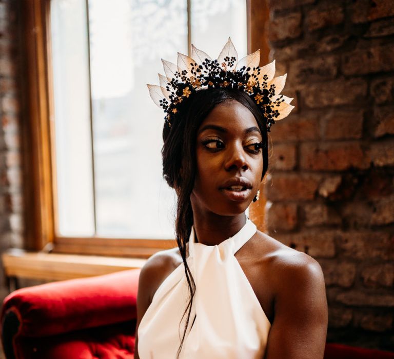 Black and gold Hermione Harbutt headdress for rust wedding theme