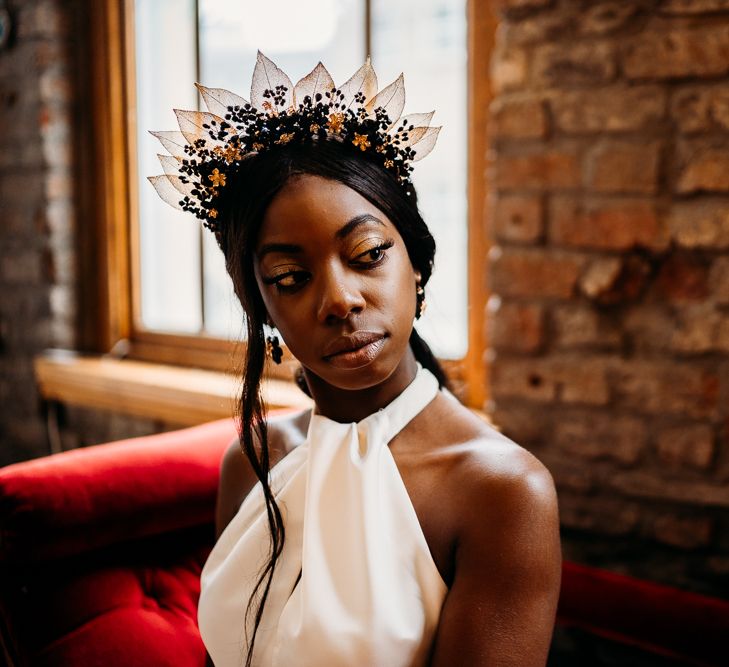 Hermione Harbutt Titania black crown with gold leaves and black Swarovski crystals