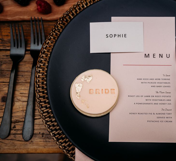 Menu card, biscuit favour, lollipop and name place setting