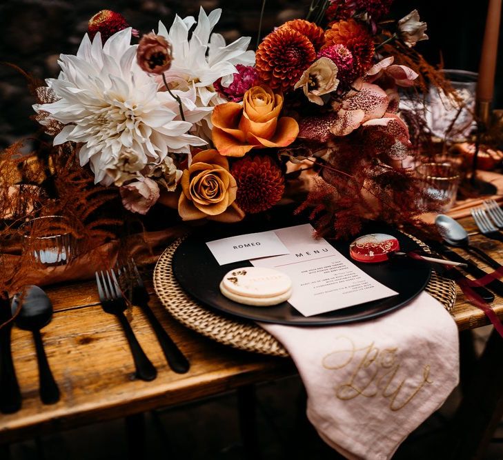 Caramel, raspberry and rust wedding theme table decor and details