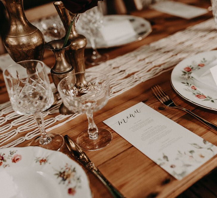 Wonderland Invites Wedding Stationery | Table Scape | Goblets, Macrame &amp; Vintage Plate Wedding Decor | Boho at The Barns at Lodge Farm, Essex, by Rock The Day Styling | Kelsie Low Photography