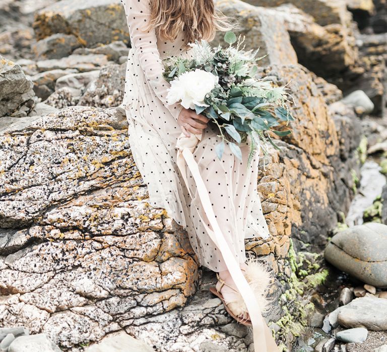 Bridal hat and flip flops for coastal wedding