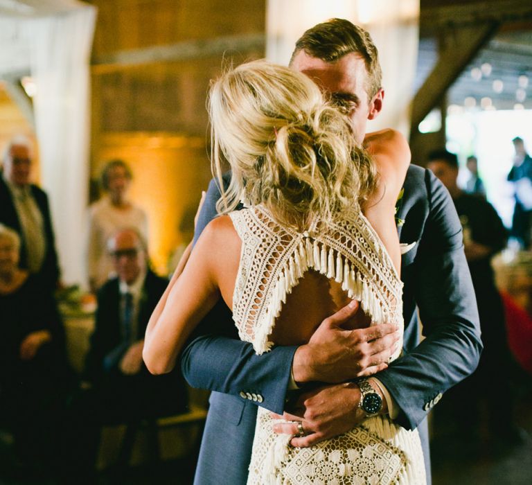 Lace wedding dress with fringe back detail