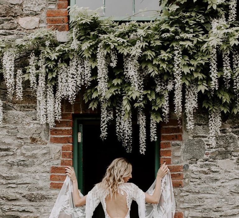 Low back a big sleeve boho wedding dress. . Boho wedding dresses