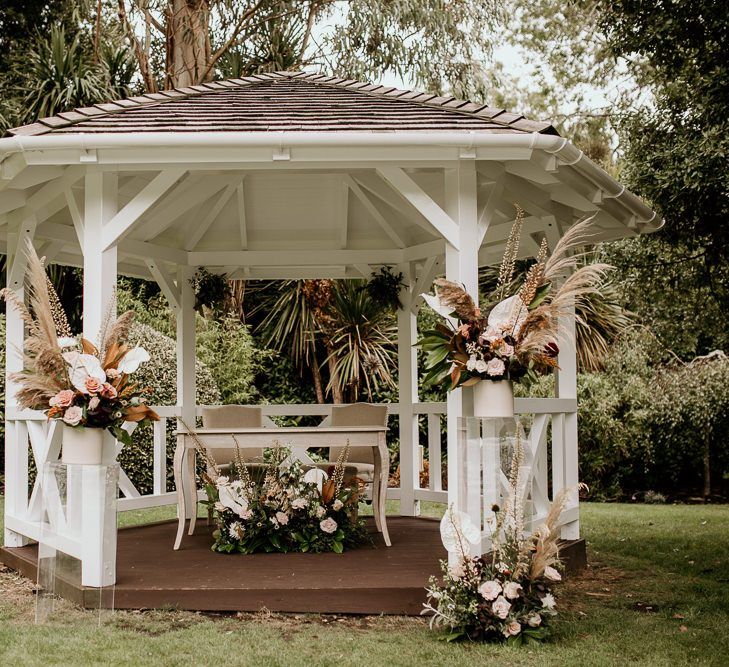 Wooden gazebo wedding altar